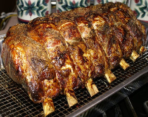 Rotisserie Standing Prime Rib. Flame Show Cooking Catering or Drop Off Catering