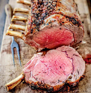 Rotisserie Standing Prime Rib. Flame Show Cooking Catering or Drop Off Catering