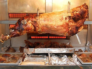 Rotisserie Whole Ox 800lb, 800 servings. Flame Show Cooking Catering