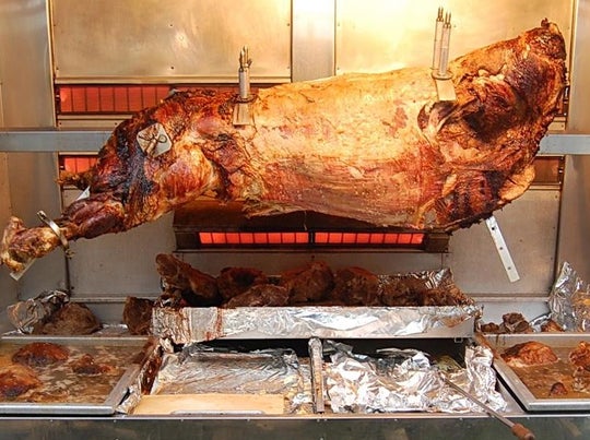 Rotisserie Whole Ox 800lb, 800 servings. Flame Show Cooking Catering