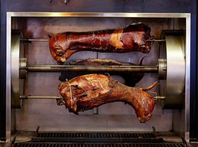 Rotisserie Whole Pig - Lamb - Goat. Flame Show Cooking Catering or Drop Off Catering