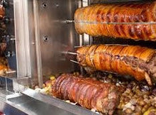 Load image into Gallery viewer, Rotisserie Whole Porchetta. Flame Show Cooking Catering or Drop Off Catering
