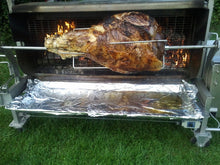 Load image into Gallery viewer, Rotisserie Whole Steamship of Beef. Flame Show Cooking Catering or Drop Off Catering
